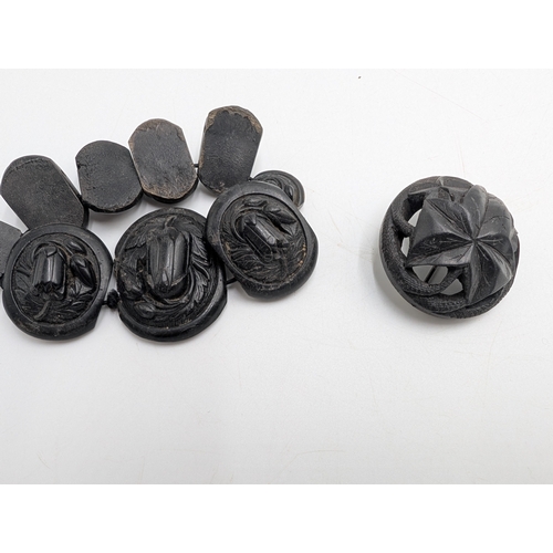 40 - Three 19th C. Irish bog oak crosses, three bracelets and three brooches.