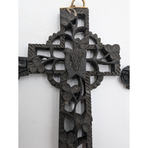 41 - Three 19th C. Irish bog oak crosses, three bracelets and three brooches.