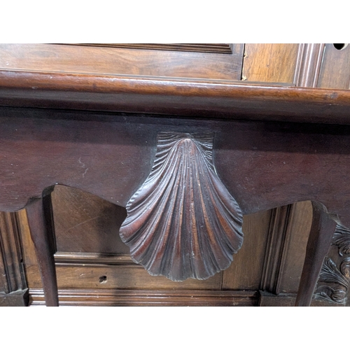 46 - 19th C. Irish mahogany Silver table on four claw and ball feet with shaped shell apron. {74  cm H x ... 
