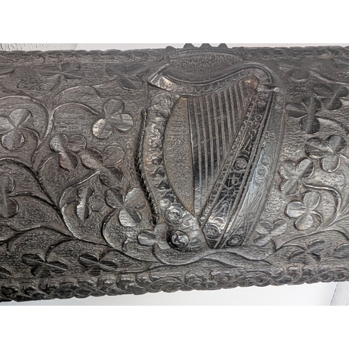 5 - 19th C. Irish bog oak dome topped writing box carved with Shamrocks and Harps. {14 cm H x 24 cm W x ... 