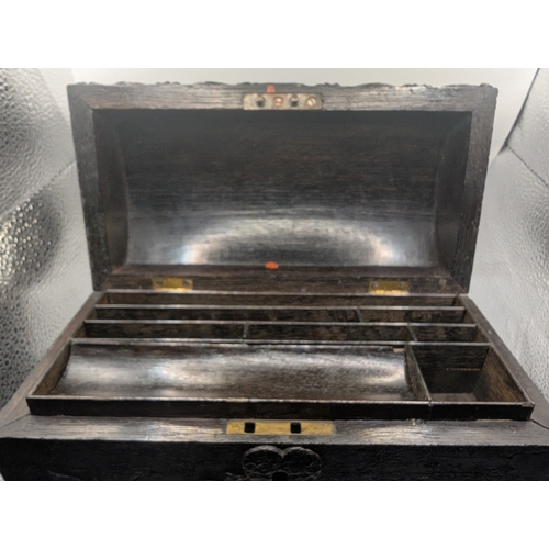 5 - 19th C. Irish bog oak dome topped writing box carved with Shamrocks and Harps. {14 cm H x 24 cm W x ... 