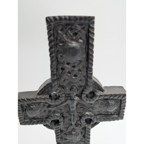 51 - 19th C. Irish bog oak Celtic cross. {33 cm H x 15 cm W x 6 cm D}.