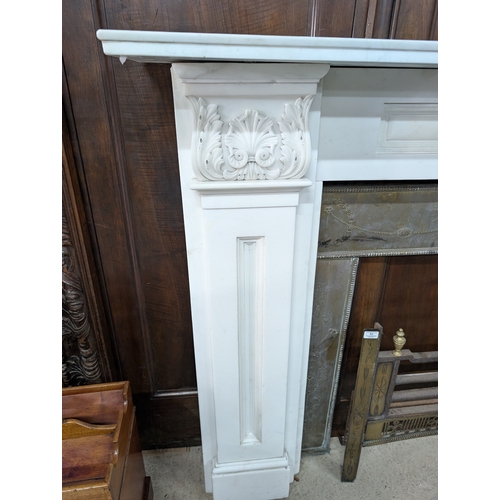 52 - Irish William IV statutory Carrera marble fire surround decorated with carved shell and acanthus lea... 