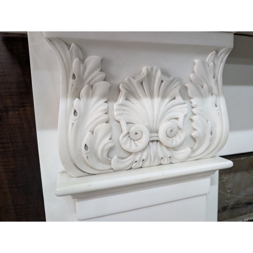 52 - Irish William IV statutory Carrera marble fire surround decorated with carved shell and acanthus lea... 