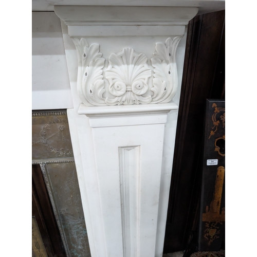 52 - Irish William IV statutory Carrera marble fire surround decorated with carved shell and acanthus lea... 