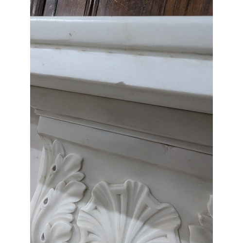 52 - Irish William IV statutory Carrera marble fire surround decorated with carved shell and acanthus lea... 