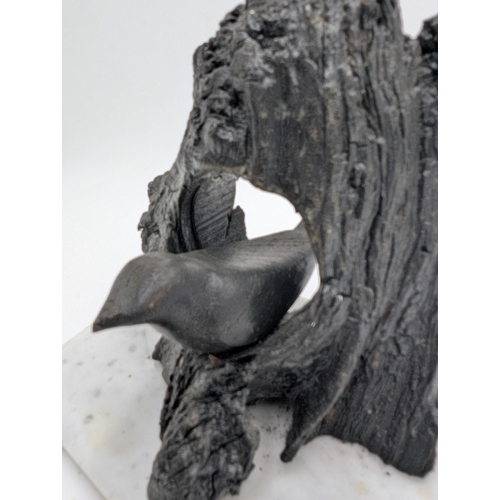 59 - 19th C. Irish bog oak model of Bird in nest on marble base. {18 cm H x 20 cm W x 14 cm D}.