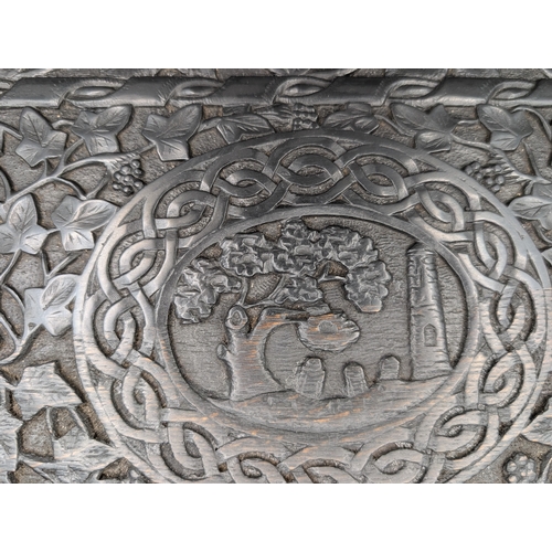 7 - 19th C. Irish box oak box carved with Ivy leaf and depicting graveyard and Round Tower and Abbey.  {... 