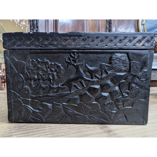 7 - 19th C. Irish box oak box carved with Ivy leaf and depicting graveyard and Round Tower and Abbey.  {... 