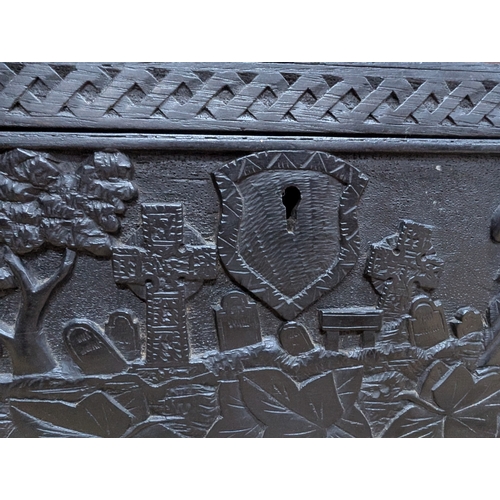 7 - 19th C. Irish box oak box carved with Ivy leaf and depicting graveyard and Round Tower and Abbey.  {... 