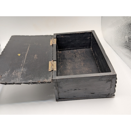 8 - 19th C. Irish bog oak box carved with Shamrocks and Harp. {7 cm H x 19 cm W x 4 cm D}.