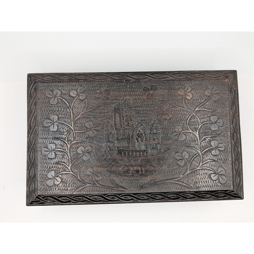 9 - 19th C. Irish bog oak box carved with Shamrocks and Muckross Abbey scene. {5 cm H x 17 cm W x 11 cm ... 