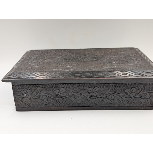 9 - 19th C. Irish bog oak box carved with Shamrocks and Muckross Abbey scene. {5 cm H x 17 cm W x 11 cm ... 