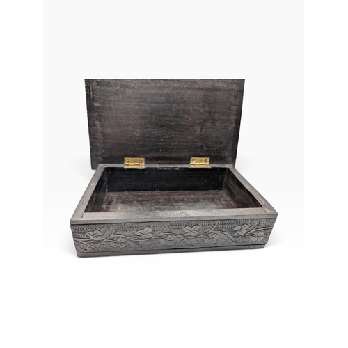 9 - 19th C. Irish bog oak box carved with Shamrocks and Muckross Abbey scene. {5 cm H x 17 cm W x 11 cm ... 