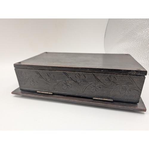 9 - 19th C. Irish bog oak box carved with Shamrocks and Muckross Abbey scene. {5 cm H x 17 cm W x 11 cm ... 