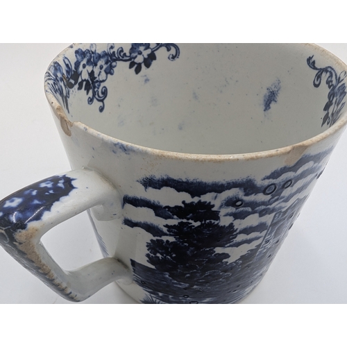 90 - Two 1st period Belleek mugs and a transferware mug. {10 cm H x 13 cm W x 10 cm D}.