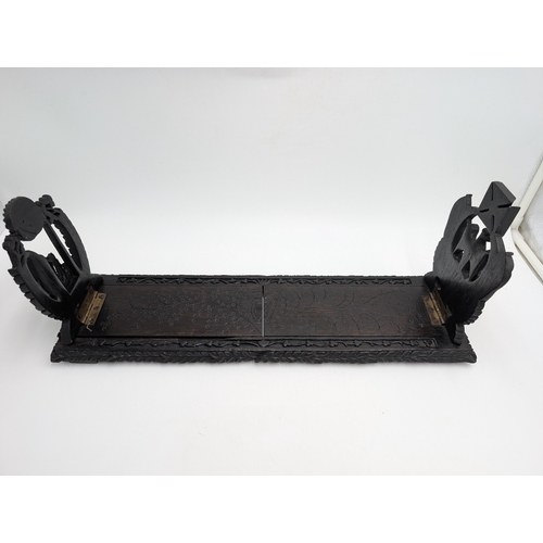 92 - 19th C. Irish carved bog oak book stand depicting Queen Maeve with a Harp and Eagle. {18 cm H x 49 c... 