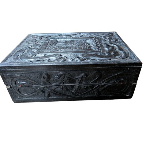 14 - 19th C. Irish bog oak box carved with Muckross Abbey and Celtic Cross. {13 cm H x 36 cm W x 25 cm D}... 