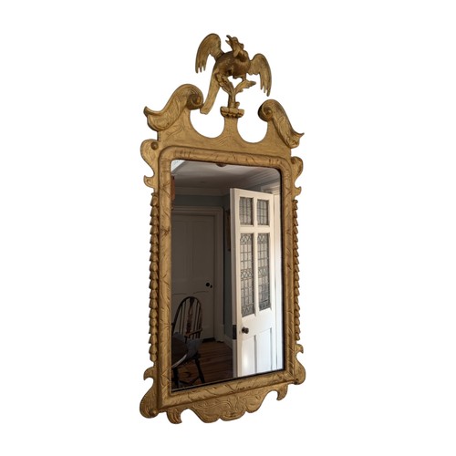 441 - Irish Georgian giltwood pier mirror decorated with Hoho bird. {120 cm H x 58 cm W}.