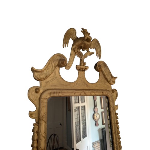 441 - Irish Georgian giltwood pier mirror decorated with Hoho bird. {120 cm H x 58 cm W}.