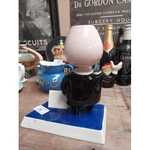 25 - Carltonware Martell Brandy ceramic advertising figure. {20 cm H x 18 cm W x 10 cm D}.