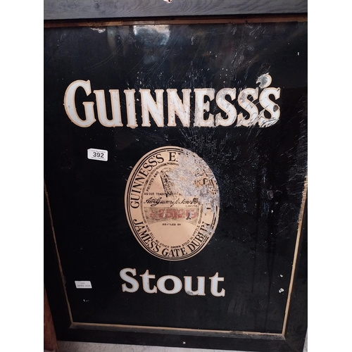 52 - Framed enamel Guinness's Stout Label advertising sign. {75 cm H x 61 cm W}.