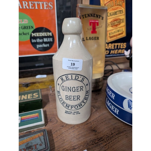 19 - Reids Blomfontein stoneware ginger beer bottle {23 cm H x 9 cm Dia.}.