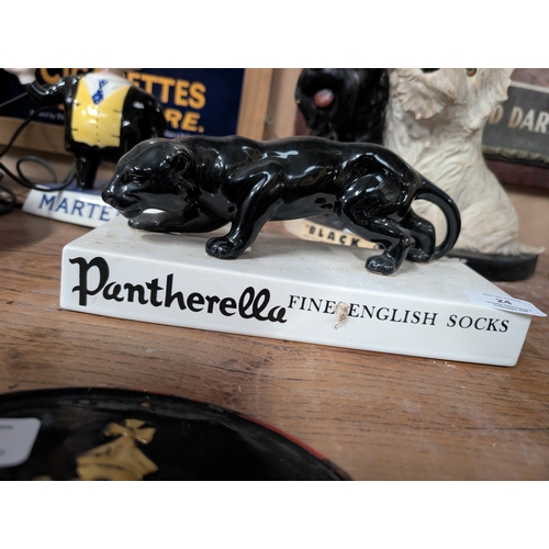 24 - Pantherella Fine English Socks advertising figure. {11 cm H x 23 cm W x 9 cm D}.