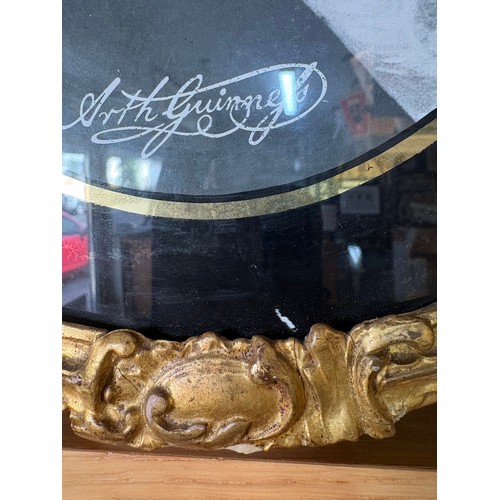 28 - Early 19th C. reverse painted on glass image of Arthur Guinness with 23 carat gold border {40cm H x ... 