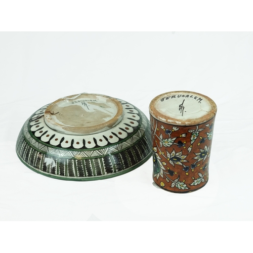 33 - A Polychrome-Painted Armenian Earthenware Pottery Dish and Mug, Jerusalem, circa 1948-1967. 

Of rou... 