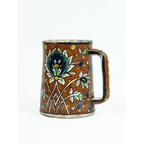 33 - A Polychrome-Painted Armenian Earthenware Pottery Dish and Mug, Jerusalem, circa 1948-1967. 

Of rou... 