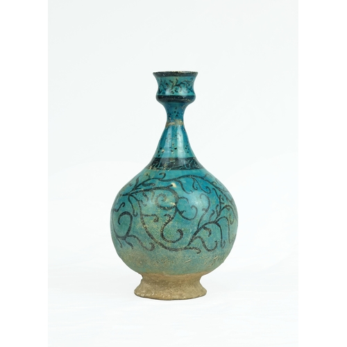 39 - Ancient Persian Turquoise Kashan Lustre Vase Bottle.

Painted in black under a turquoise glaze, the ... 