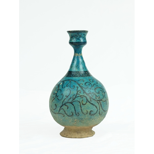 39 - Ancient Persian Turquoise Kashan Lustre Vase Bottle.

Painted in black under a turquoise glaze, the ... 