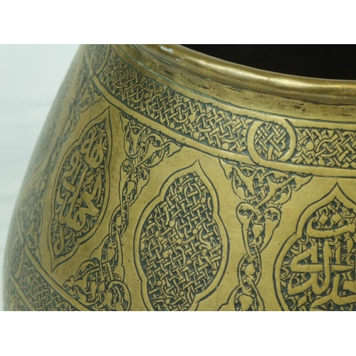 42 - Mamluk Style Engraved Brass Bowl, 19th Century .

Of rounded form with sides tapering to rounded rim... 