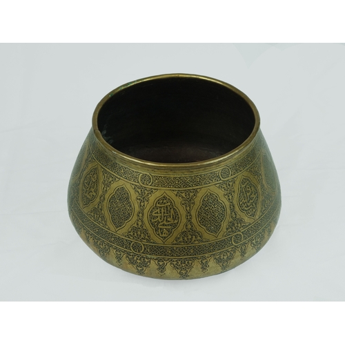 42 - Mamluk Style Engraved Brass Bowl, 19th Century .

Of rounded form with sides tapering to rounded rim... 