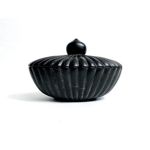 53 - Antique handcrafted unique hard stone black box, 20th Century.

A decorative box with hand chased pa... 