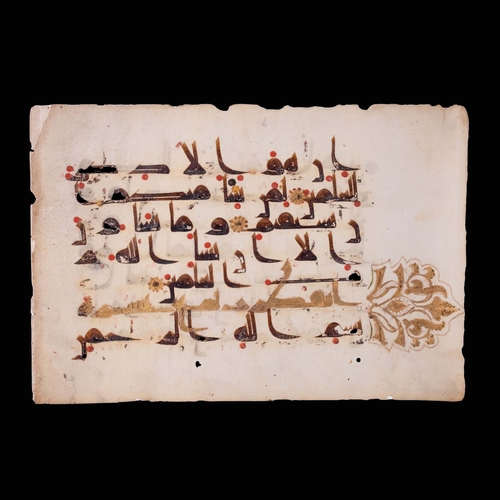 10 - A  KUFIC QUR’AN FOLIO, NORTH AFRICA OR NEAR EAST, 9TH/10TH CENTURY 

