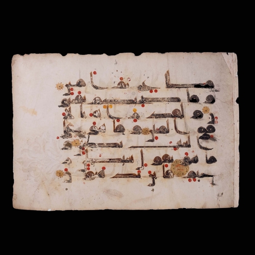 10 - A  KUFIC QUR’AN FOLIO, NORTH AFRICA OR NEAR EAST, 9TH/10TH CENTURY 

