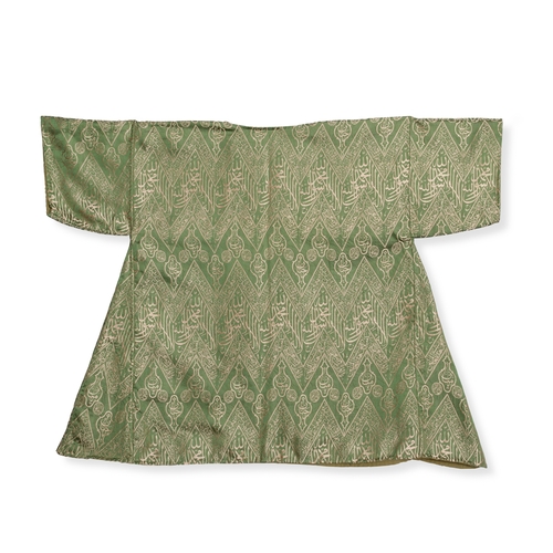 104 - A GREEN SILK LAMPAS CALLIGRAPHIC KAFTAN, OTTOMAN TURKEY OR EGYPT, 19TH / 20TH CENTURY

An Ottoman Ka... 