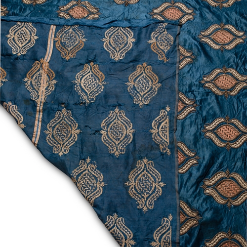 105 - AN OTTOMAN SILK SATIN COVER, OTTOMAN TURKEY, 19TH CENTURY 

Of rectangular form and comprised of thr... 