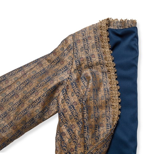 112 - A SILK AND METAL-THREAD COAT NEAR EAST OR NORTH AFRICA, 18TH CENTURY 

Stitched into a coat with blu... 