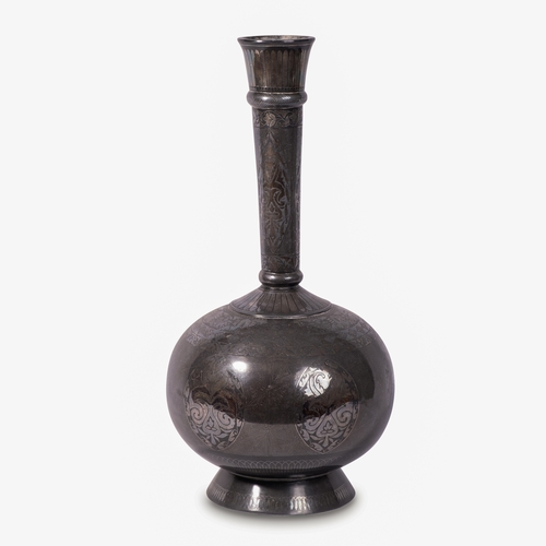 131 - AN INDIAN BIDRI BOTTLE, HYDERABAD INDIA, 19TH CENTURY 

Of bulbous shape, standing on a short splaye... 