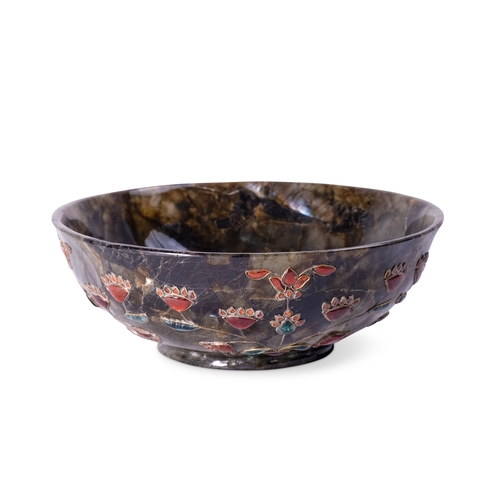 58 - A MUGHAL STYLE DARK SPINACH GREEN JADE BOWL, INDIA, 19TH CENTURY	

Of deep rounded form supported by... 