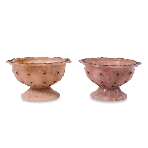 59 - A PAIR OF MUGHAL JADE BOWLS, INDIA, 20TH CENTURY

Of rounded form supported by a short spreading foo... 