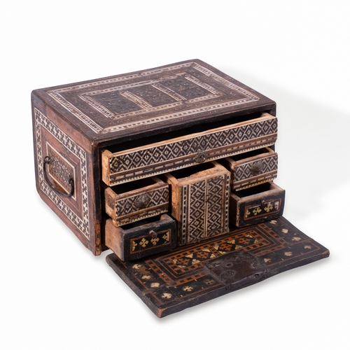 77 - A NASRID WOODEN CABINET, SPAIN, 16TH CENTURY 	

Of typical rectangular shape, elegantly crafted box ... 