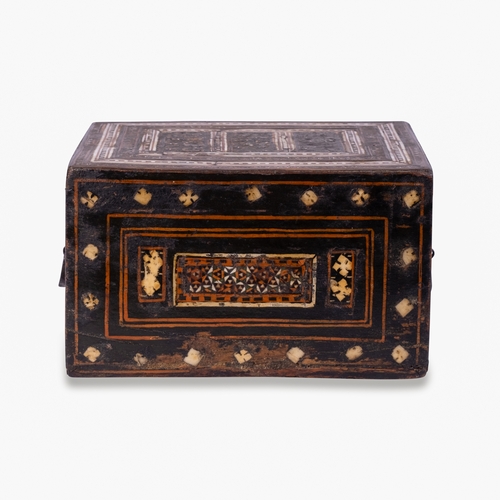 77 - A NASRID WOODEN CABINET, SPAIN, 16TH CENTURY 	

Of typical rectangular shape, elegantly crafted box ... 