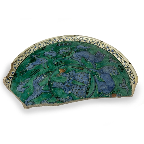 84 - A FRAGMENT OF RARE IZNIK FIGURAL POTTERY DISH, IZNIK OTTOMAN TURKEY, CIRCA 1600

Of circular form, f... 