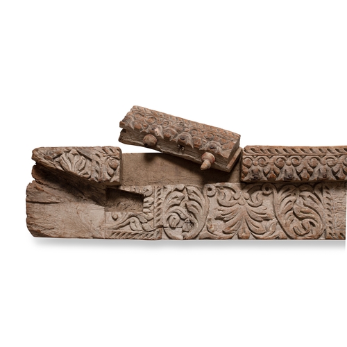 91 - A CARVED WOODEN BEAM, MUGHAL INDIA (16TH-17TH CENTURY)

Of elongated form, carved in high relief wit... 