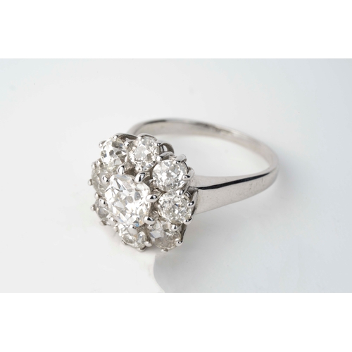 10 - White Gold Diamond Ring  

A diamond flower head ring, featuring a larger central diamond, complemen... 