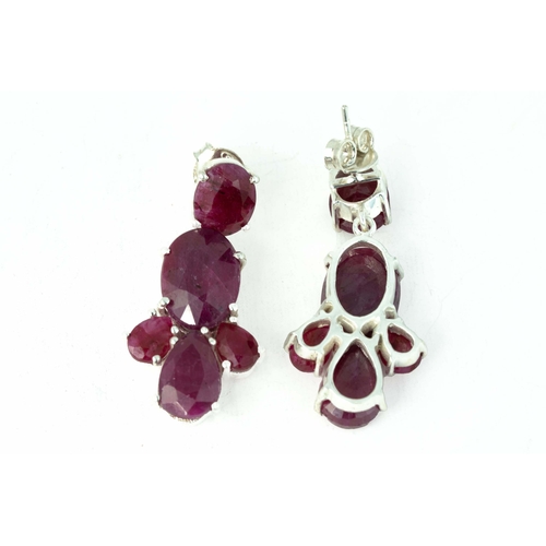 103 - Oval Shaped Faceted Corundum/Ruby Silver Earring 

Wide with push back locks
15grams total weight 
3... 